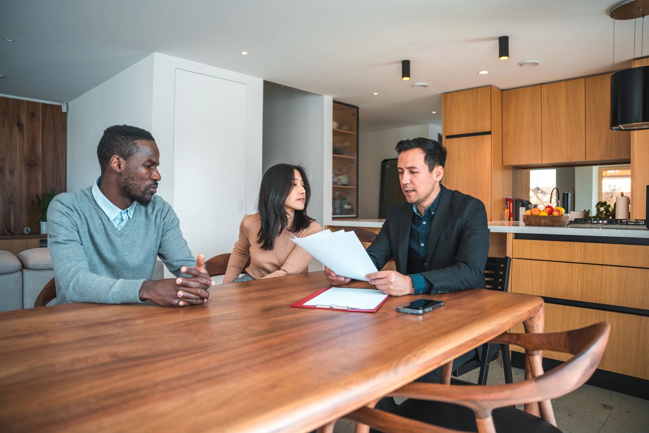 Client meeting with advisor to finalize real estate financing