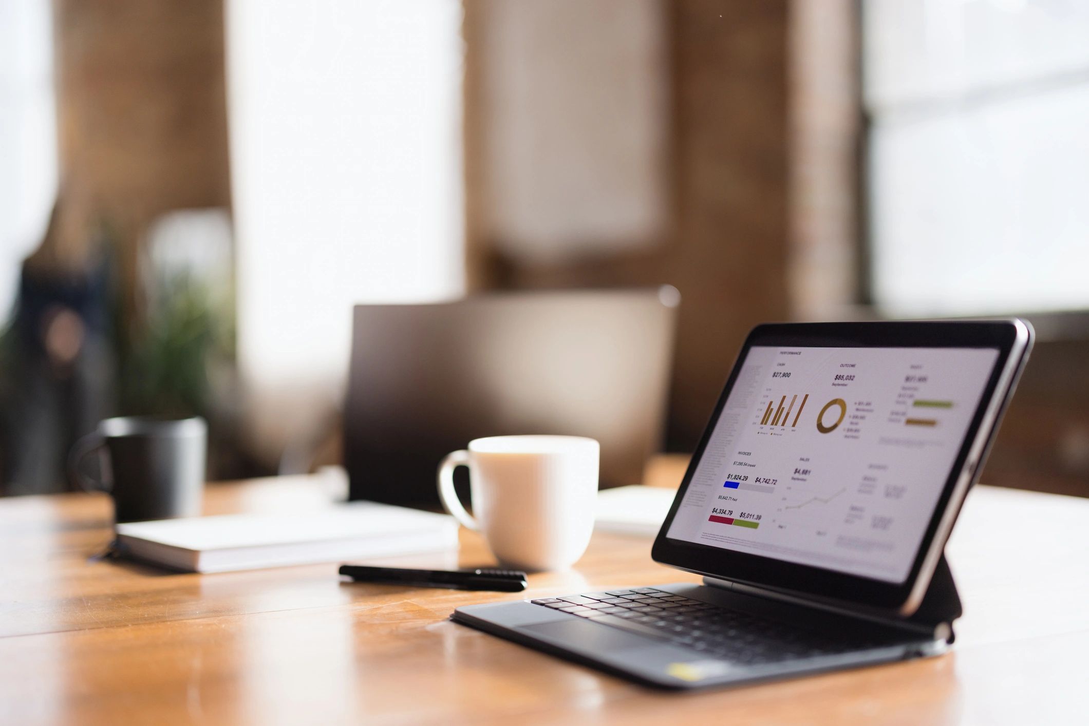 Financial charts on a tablet representing financing fundamentals